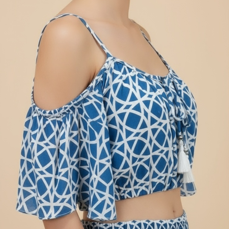 Blue and white patterned outfit on a beige background